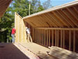 Set crew installing the attic roof section end caps in place on the day of set in Monmouth County, Oceanport, NJ 